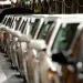 A line worker checks vehicles at the General Motors Hamtramck assembly plant in Hamtramck, Mich.