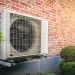 Heat pump on brick wall