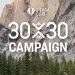 Cliffs in Yosemite with pine trees in the foreground with the Sierra Club logo and words 30x30 Campaign overlaid.