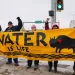 People rally in solidarity with the Standing Rock grassroots and Cheyenne River Sioux Tribe before US Army Corps hearing in Bismarck on the Dakota Access pipeline. 