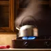 tea kettle on a gas stove