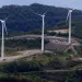 Three windmill turbines sit atop Buffalo Mountain in Oliver Springs, Tenn