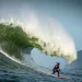 Bianca Valenti surfing