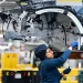 An employee works in the X3 X4 assembly hall at the BMW Spartanburg plant in Greer, S.C. 