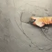 Worker sets cement