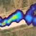 Satellite or aircraft aerial photo of a dark-blue-colored methane plume rising up from a source in a flat, dry area of Midland, Texas
