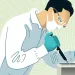 Illustration shows a lab technician with goggles and mask working on a box with a syringe.
