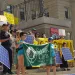 Folks rally at the Idaho State Capitol calling for more solar power 
