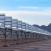 Solar PV array in front of mountains in Arizona