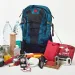 A go-bag with emergency items displayed outside it