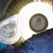 A doctor holds a nebulizer mask in an operating room.