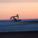 In this Feb. 25, 2015 photo, a pump jack for pulling oil from the ground is seen near New Town, N.D.