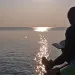 Sherman Neal II, the deputy director of the Sierra Club Military Outdoors campaign and a Marine Corps veteran takes a break from hiking along the shores of Lake Michigan. | Photo courtesy of Sherman Neal II