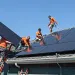 solar panels being installed on homes