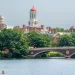 Kayaking under the John W. Weeks Bridge in the Charles River with Harvard University campus in Cambridge, Massachusetts, in the background. 