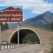  A car comes through a tunnel with a wildlife crossing over Highway 93 in Montana, with a sign saying "Animals' Crossing" and two words from the language of the Confederated Salish and Kootenai Tribes that reads similar to "Xwixweyut Nxlews."