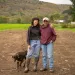 Tom Hutson (transitioning farmer) and Sea Matias (new generation farmer) stand together on the commons. Photo courtesy of Jamieson Johnson 