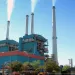 In this July 1, 2013, file photo, smoke rises from the Colstrip Steam Electric Station, a coal burning power plant in Colstrip, Montana