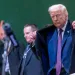 President Donald Trump walks down stairs during the Annual Meeting of the World Economic Forum, WEF, in Davos, Switzerland, Thursday, Jan. 22, 2026. (Laurent Gillieron/Keystone via AP)