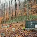 Dustin White's family graveyard lies in a hollow between two mountains that mining companies are flattening to get at their coal.