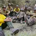 Arnold Schwarzenegger hangs out with firefighting "hotshots" in Years of Living Dangerously, a new series by David Gelber (top left) and Joel Bach (below).
