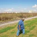 Wilkey Declouet walks by the levee near the proposed RAM coal terminal site, about a half mile away from Ironton, Louisiana.