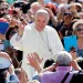 Pope Francis greets the crowd as he arrives in St. Peter's Square, Vatican City.