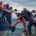 Migrants arrive at the Greek island of Lesbos after crossing the Aegean Sea from Turkey.