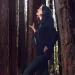 Naturalist and writer Helen Macdonald takes a breather in a redwood grove while on a book tour.