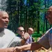 U.S. president Barack Obama and Sierra Club president Aaron Mair shake hands in Yosemite.