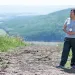 Connie Greyeyes in front of Peace River