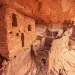 Poncho House, a crumbling Ancestral Puebloan redrock cliff dwelling, in Comb Ridge, Utah