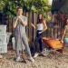 Anna, Ugo, Emma, and Mila Angeletti pose with Back2earth bins, a shovel, and a wheelbarrow.