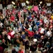 Union firefighters and Wisconsin residents protest in the Madison state capitol.