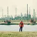 Eight major petrochemical and hazardous-waste facilities spew emissions into Hilton Kelley's neighborhood.