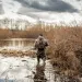 Hunter in a swamp