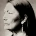 Deb Haaland sits facing the camera with her hands in her lap.