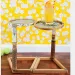 A pair of wooden rackets serves up a sporty side table