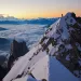 Arriving at the Col Eccles just as day breaks over Italy. Photo by Jon Griffith in Alpine Exposures.