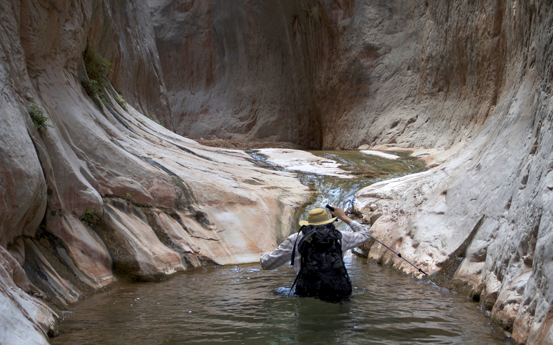 Author Peter Frick-Wright eats lunch and dries out his feet near the Grand Canyon.