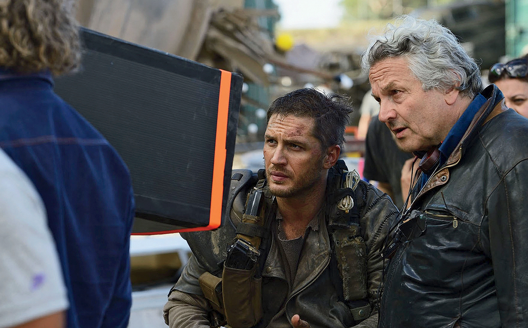 George Miller directs on the set of Mad Max: Fury Road.