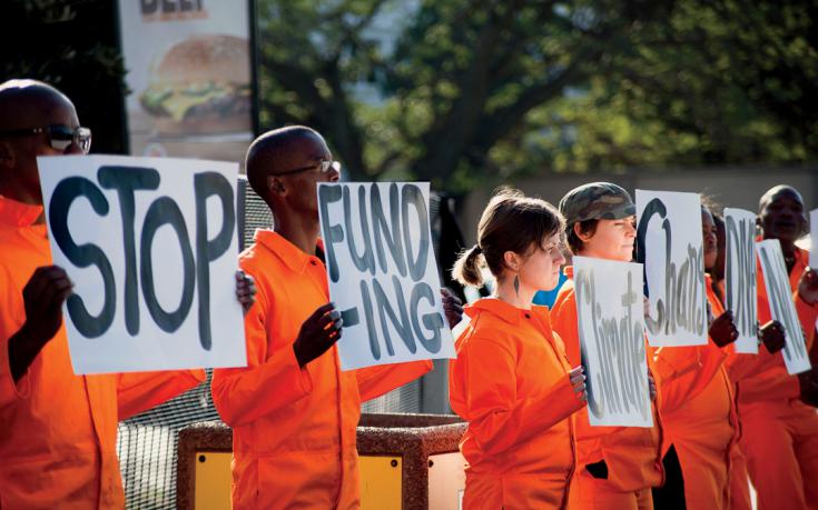 Divestment Goes Global The student movement to defund the fossil fuel industry graduates and goes to work. By Rosie Spinks