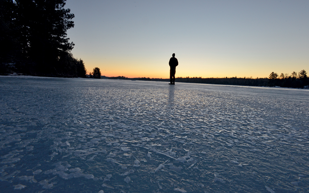 Flakes of hoarfrost on Knife Lake at dawn.