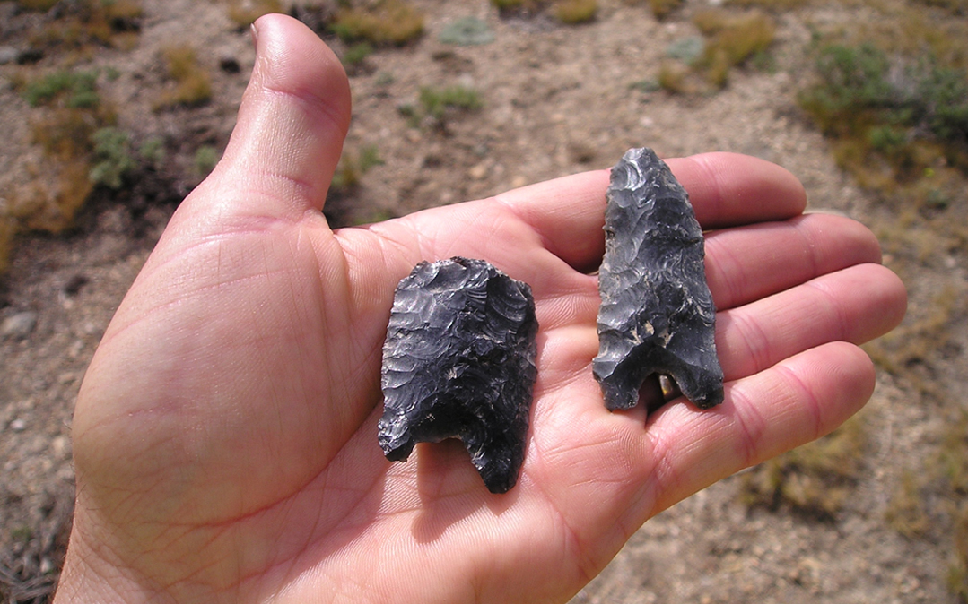 An archaeologist holds points found at one of the High Sierra sites.​