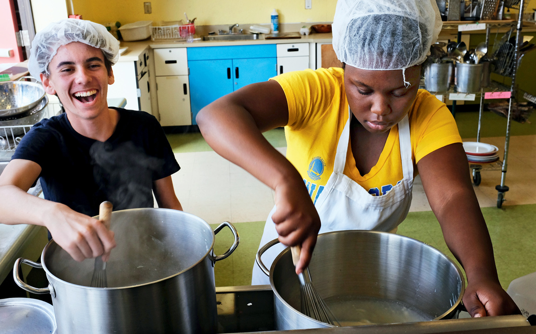 Budding chefs participate in Berkeley, California's Growing Leaders program. 		