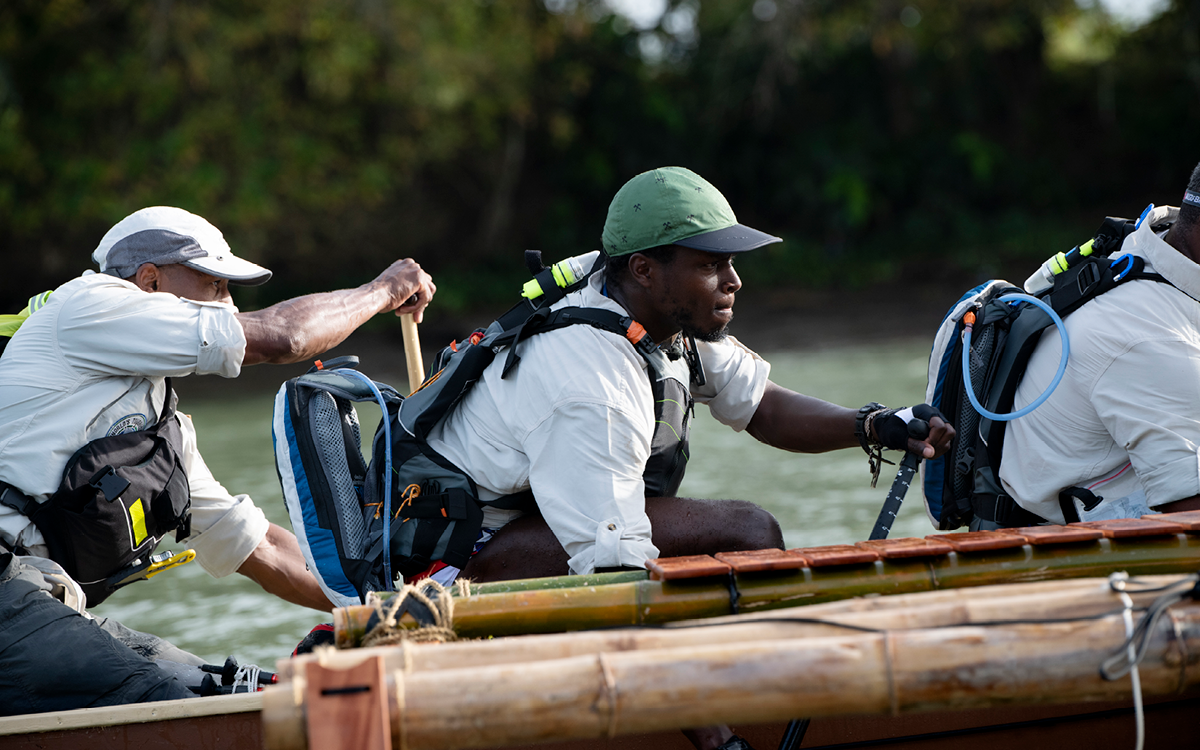 Three Team Onyx members are paddling