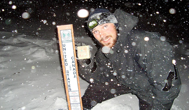 Ross celebrates at the Canadian border in the heart of the season's fiercest storm.