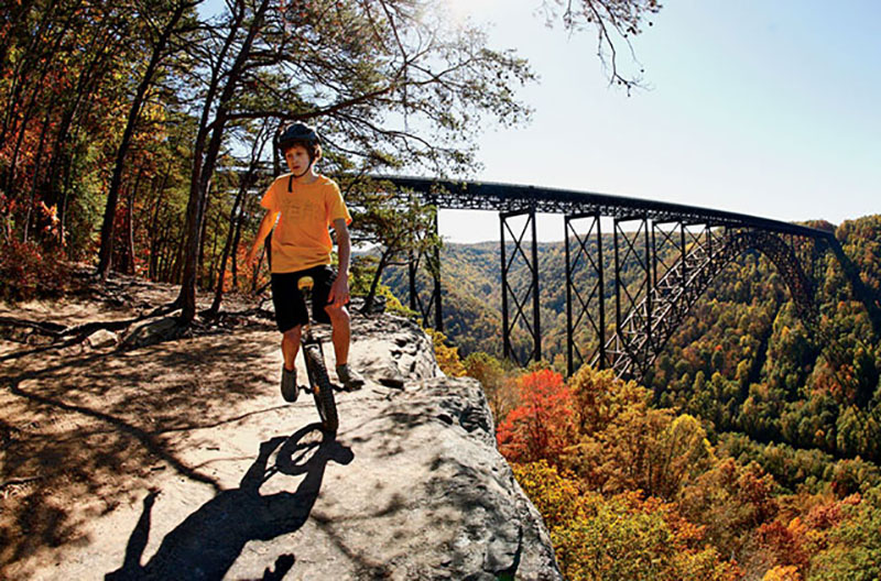 One-wheel mountain biking on the north rim of the gorge near Fayetteville.