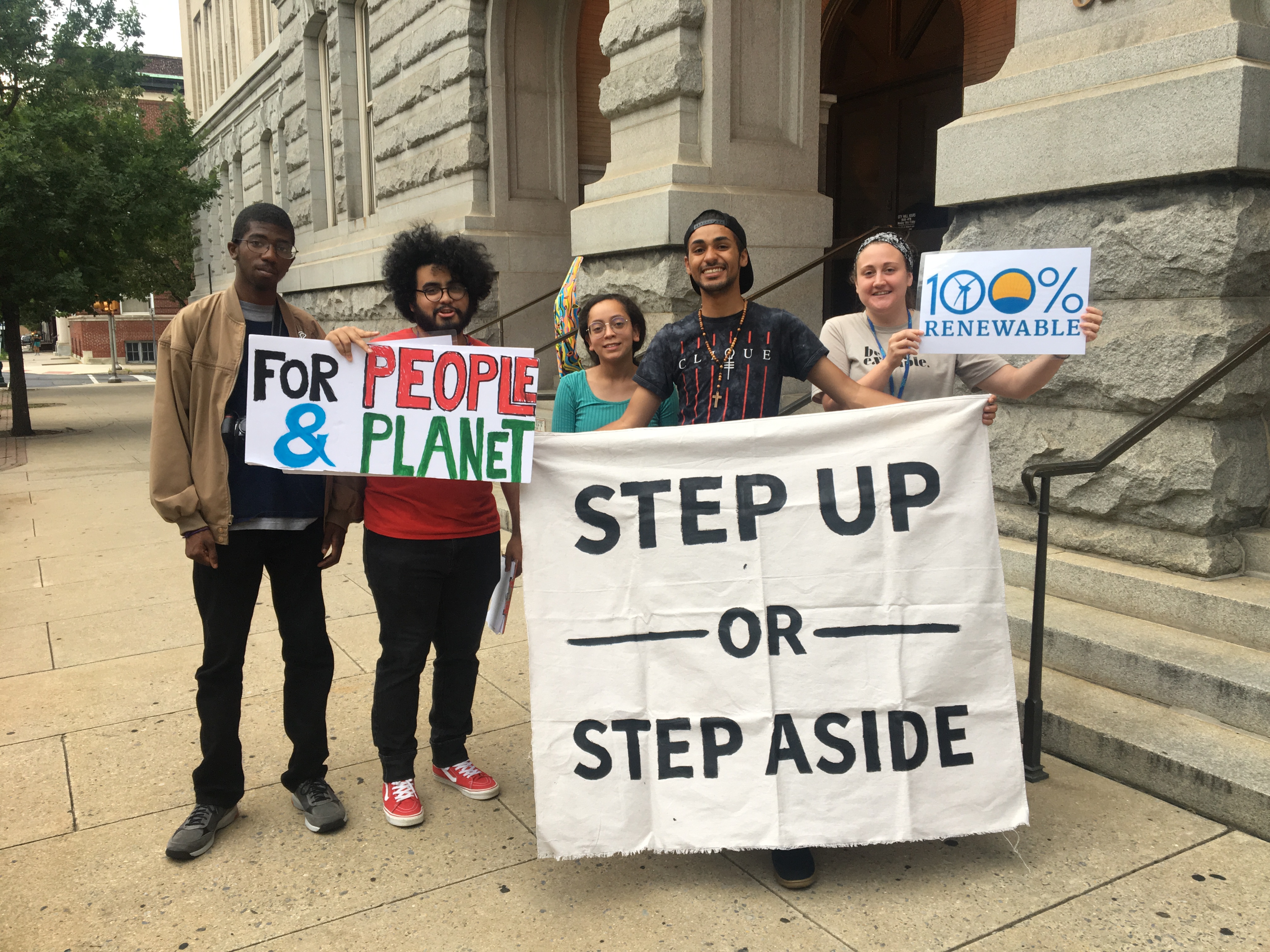 Supporters outside Reading City Hall before the City Council voted on the 100% renewable energy resolution