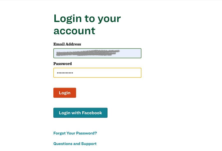 Two text fields labeled "Email Address" and "Password" are filled in. Below the fields is an orange button that reads "Login" and below that is blue button that reads "Login with Facebook'.